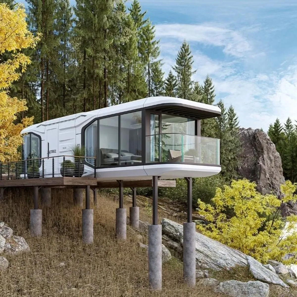 Une cabane moderne et surélevée aux parois vitrées est située dans une forêt. Elle se dresse sur pilotis au-dessus d'un terrain rocheux, entourée d'arbres verts luxuriants et de feuillages d'automne, avec un ciel bleu clair au-dessus.